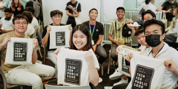 Interns volunteering at an event and networking with each other