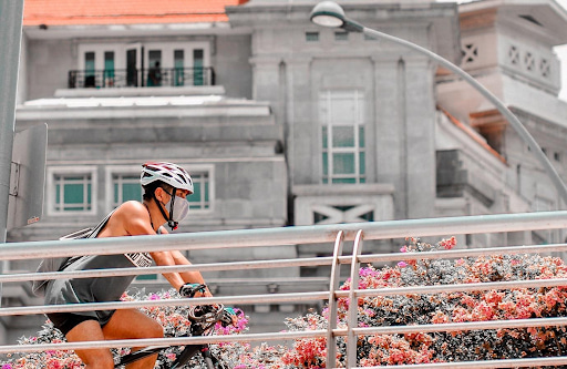 Post-covid-19 in Singapore: A man cycling during the day