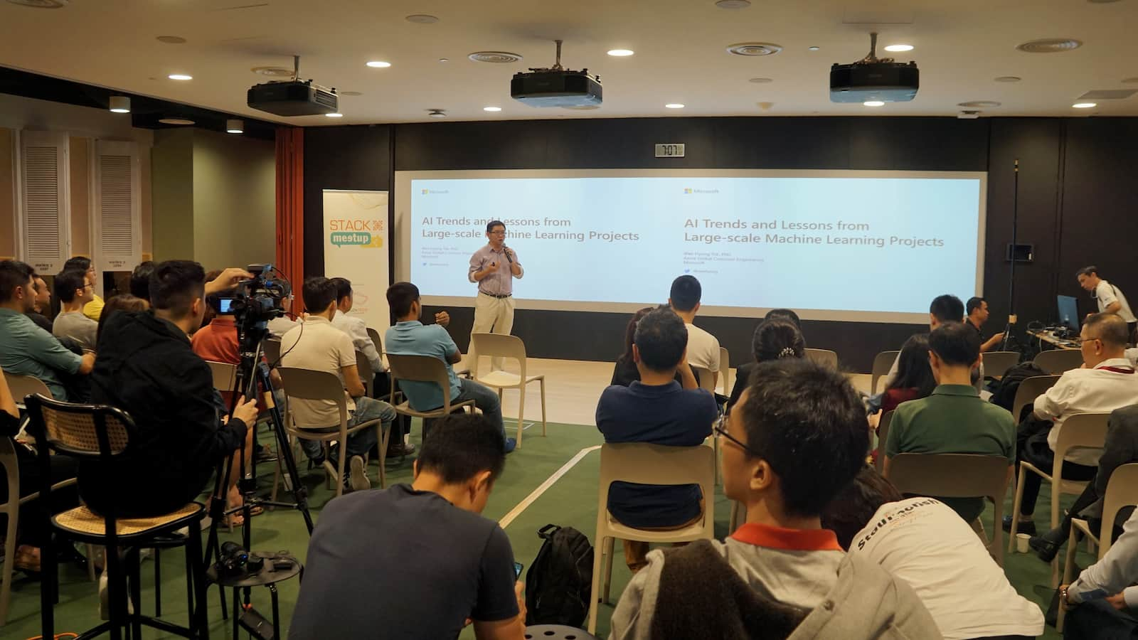 A GovTechie sharing on AI trends during an event